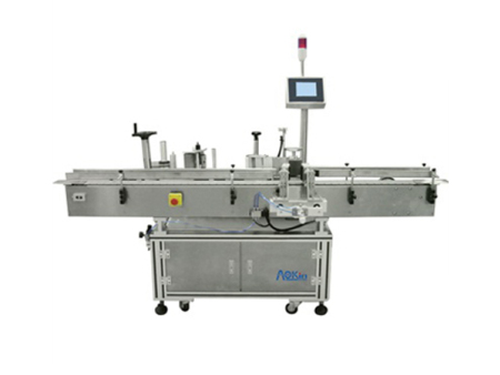 Vertical round bottle positioning labeling machine