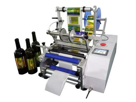 HJ628-1半自動圓瓶頂貼標機