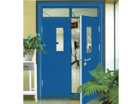 What is the function of a smoke barrier wall?