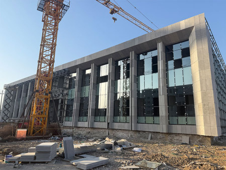Construction site of cement fiberboard exterior wall panel at Juancheng People's Procuratorate