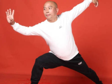 王国强