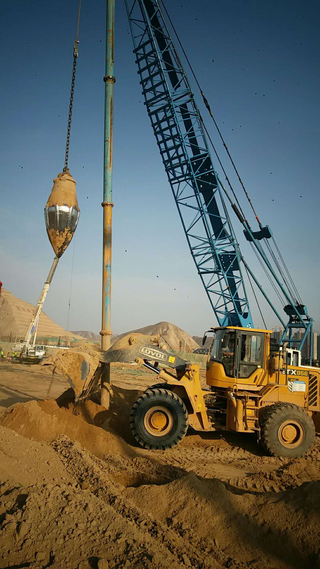 蘭州萬科萬科城項目一期地基處理工程|SDDC工法旋挖引孔、沖擊成樁-陜西巖泰基礎工程有限公司